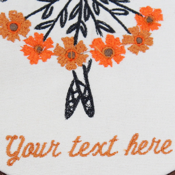 Handmade Embroidered Ballerina flower with Personalized text   Frame size: 6" Design: Ballerina Color of her dress: Orange Color of text: Cinnamon  Text: Please send us your text (up to three words) 